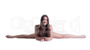 Pretty young nude woman doing split isolated