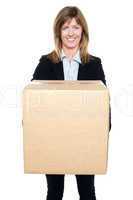 Business lady holding packed carton