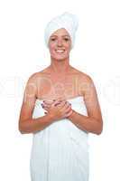 Sexy middle aged spa woman in white towel