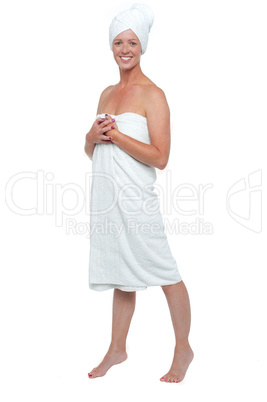 Spa woman wrapped in white towel