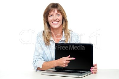 Female representative presenting new laptop