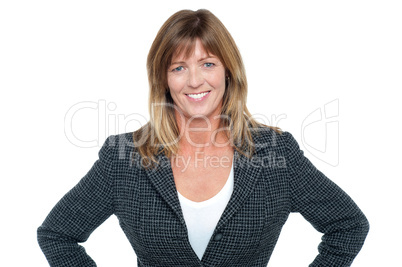 Business executive with hands on her waist