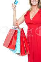 Shopaholic woman, cropped image