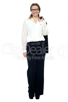 Business lady with coat slung over her shoulder