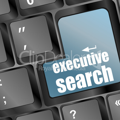 Blue executive search button on the keyboard close-up