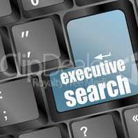 Blue executive search button on the keyboard close-up
