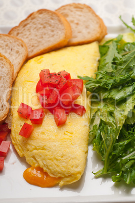 cheese ometette with tomato and salad