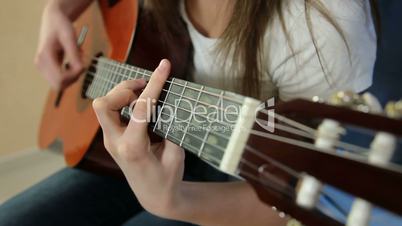 Young Girl Playing Guitar