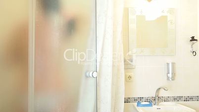 Blurred Female Body in Bathroom