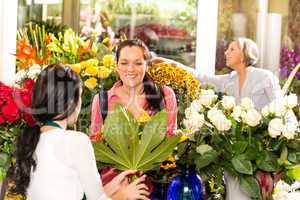 Young woman buying bouquet flower shop customer