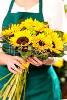 Woman holding bouquet sunflowers florist yellow flower