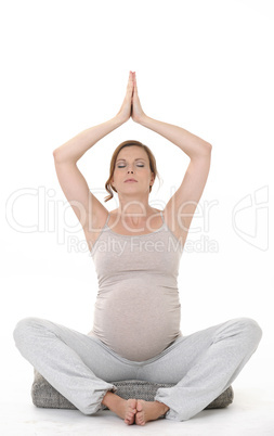 pregnant woman practicing yoga