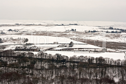 Remote farmland on the snow covered Yorkshire moors