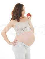 schwangere isst Apfel