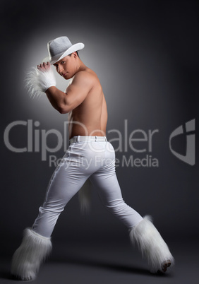 Dancer in white cowboy costume