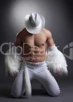 athletic dancer undress white fur cowboy costume
