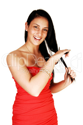 Girl cutting her hair.