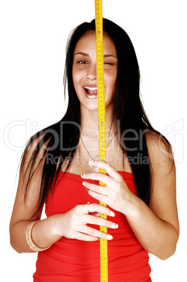 Girl with measuring stick.