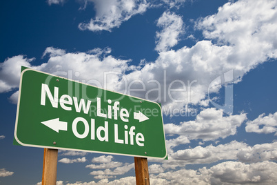 New Life, Old Life Green Road Sign Over Clouds