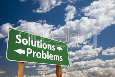 Solutions, Problems Green Road Sign Over Clouds