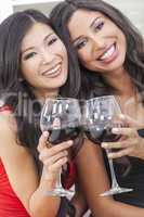 Two Happy Women Friends Drinking Wine Together