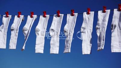 white socks hanging dolly