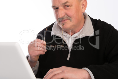 Mature man with laptop