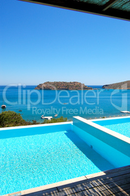 Swimming pool by luxury villa with a view on Spinalonga Island,