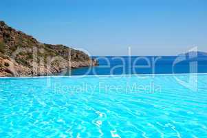 Infinity swimming pool with a view on Aegean Sea at the luxury h