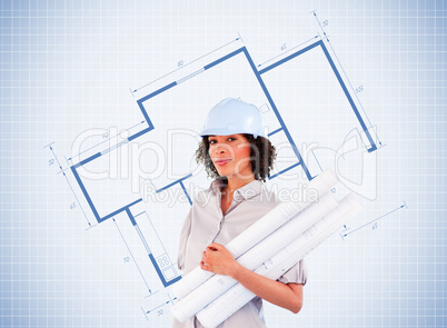 Confident architect holding plans