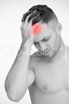 Man touching highlighted pain in head
