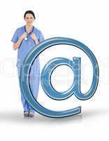 Nurse in scrubs standing beside email at symbol