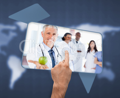 Hand selecting image of doctor holding apple