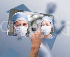 Hand selecting image of surgeons