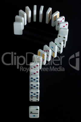 Dominoes shaped into question mark