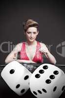 Attractive gambler betting on digital dice