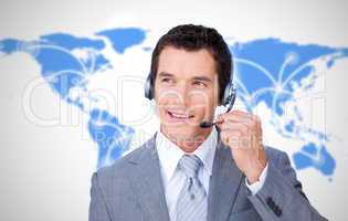 Smiling businessman using headset
