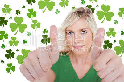 Girl in green t-shirt giving thumbs up
