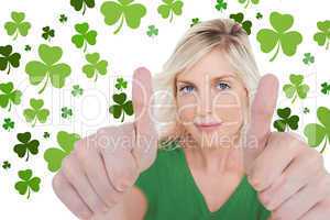 Girl in green t-shirt giving thumbs up