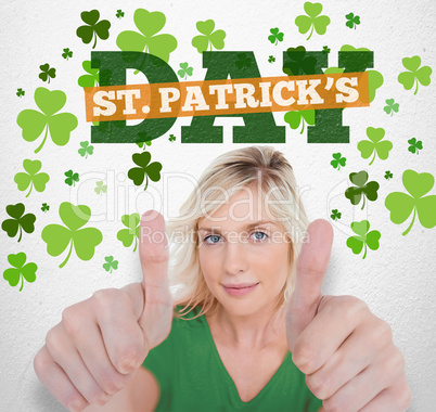 Girl in green t-shirt giving thumbs up with st patricks day gree