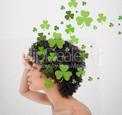 Girl looking into distance with shamrocks