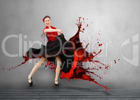 Flamenco dancer with dress turning to paint splattering