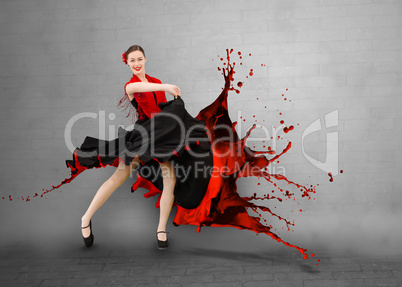 Flamenco dancer with dress turning into paint splashing