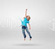 Little girl jumping with clothes turning to paint splashes