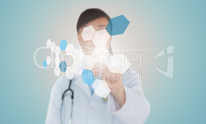 Brunette doctor pressing touchscreen displaying chemical formula