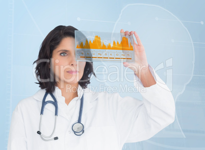 Brunette doctor looking at a graph with new technology