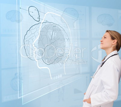 Woman doctor using a futuristic interface