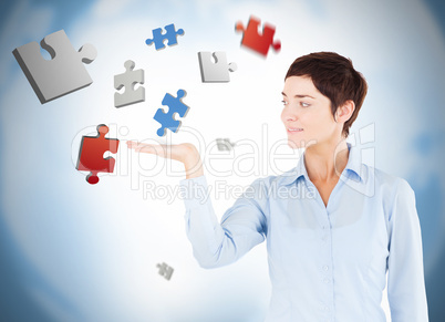 Well dressed woman with puzzles levitating