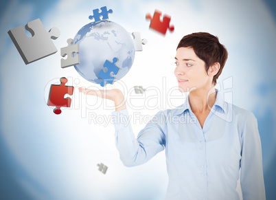 Cheerful woman with puzzles levitating