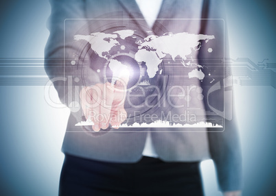 Businesswoman touching a world map on a interface